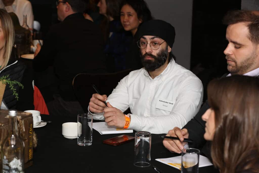 Man contemplating at a business event